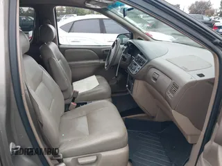 1998 Toyota Sienna LE with VIN 4T3ZF13C4WU047568, listed as a IAAI auction lot 42062449 with 130,019 mi miles. Bid and sale history available at carsss.com. Image 5.