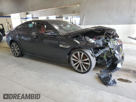 2016 Jaguar XF S with VIN SAJBM4BV0GCY13717, listed as a Copart auction lot 70385854 with 82,592 mi miles and Salvage Title. Bid and sale history available at carsss.com. Image 4.