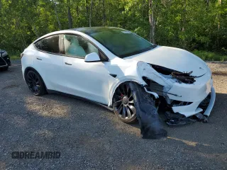2022 Tesla Model Y Performance with VIN 7SAYGDEF3NF516349, listed as a Copart auction lot 63759245 with Not provided miles and Salvage title. Bid and sale history available at DreamBid. Image 4.