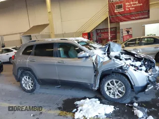 2015 Jeep Cherokee Latitude with VIN 1C4PJMCS5FW510298, listed as a IAAI auction lot 41518453 with 99,568 mi miles and . Bid and sale history available at DreamBid. Image 14.