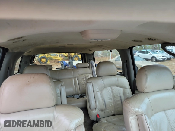 2001 Chevrolet Suburban LS z VIN 3GNEC16T51G199135, wystawiony jako IAAI lot #41748202 z przebiegiem 247 648 mil mil oraz . Historia ofert i sprzedaży dostępna na DreamBid. Obrazek 7.