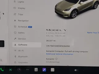 2023 Tesla Model Y Long Range with VIN 7SAYGDEE6PA064162, listed as a IAAI auction lot 41533464 with 24,337 mi miles. Bid and sale history available at carsss.com. Image 16.
