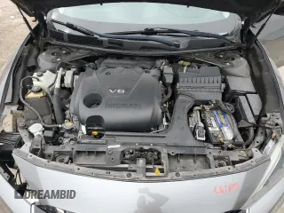 2017 Nissan Maxima SR z VIN 1N4AA6AP4HC377317, wystawiony jako Copart lot #51480785 z przebiegiem 146 594 mil mil oraz Szkoda całkowita • Salvage title. Historia ofert i sprzedaży dostępna na DreamBid. Obrazek 11.
