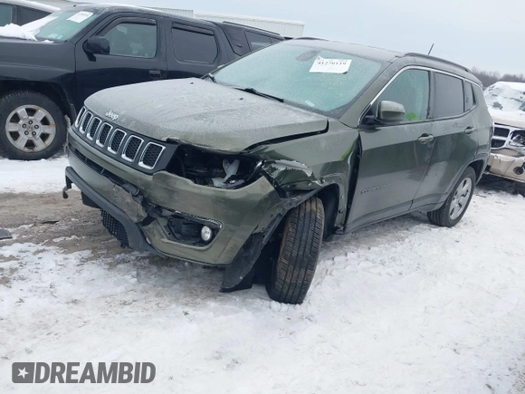 2018 Jeep Compass Altitude with VIN 3C4NJDBB1JT479462, listed as a IAAI auction lot 41276119 with 58,895 mi miles and . Bid and sale history available at carsss.com. Image 2.