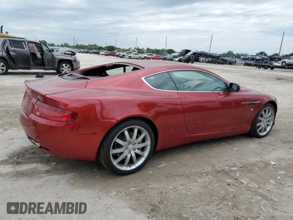 2005 Aston Martin DB9 z VIN SCFAD01A15GA00012, wystawiony jako Copart lot #65919164 z przebiegiem Nie podano mil oraz Szkody całkowita. Historia ofert i sprzedaży dostępna na DreamBid. Obrazek 3.
