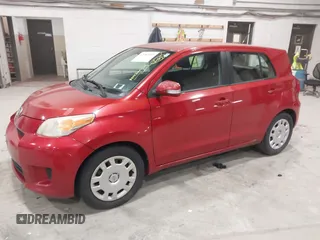 2008 Scion xD with VIN JTKKU10418J031679, listed as a IAAI auction lot 42087002 with 200,802 mi miles. Bid and sale history available at carsss.com. Image 2.