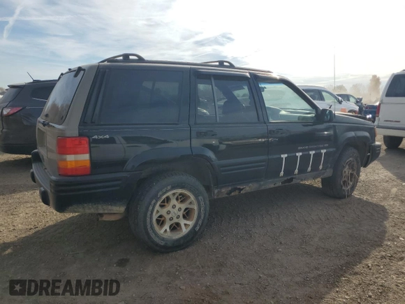 1998 Jeep Grand Cherokee Laredo with VIN 1J4GZ48YXWC299827, listed as a Copart auction lot 76898264 with 232,656 mi miles and Clean Title. Bid and sale history available at carsss.com. Image 3.