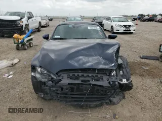 2022 Mazda MX-5 Miata Grand Touring z VIN JM1NDAM74N0500760, wystawiony jako Copart lot #55013735 z przebiegiem 37 194 mil mil oraz Szkody całkowita. Historia ofert i sprzedaży dostępna na DreamBid. Obrazek 5.