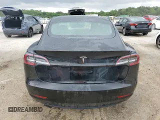 2022 Tesla Model 3 with VIN 5YJ3E1EA0NF372095, listed as a Copart auction lot 54958215 with 148,441 mi miles and Clean Title. Bid and sale history available at DreamBid. Image 6.