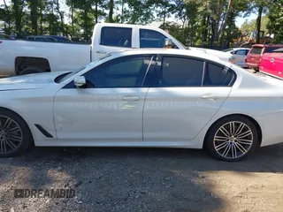 2019 BMW 5 Series 540i xDrive with VIN WBAJE7C52KWW14938, listed as a IAAI auction lot 40177765 with 57,722 mi miles and . Bid and sale history available at carsss.com. Image 14.