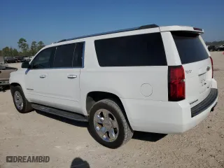2017 Chevrolet Suburban Premier with VIN 1GNSCJKC7HR128988, listed as a Copart auction lot 73958784 with 121,662 mi miles and Salvage Title. Bid and sale history available at carsss.com. Image 2.