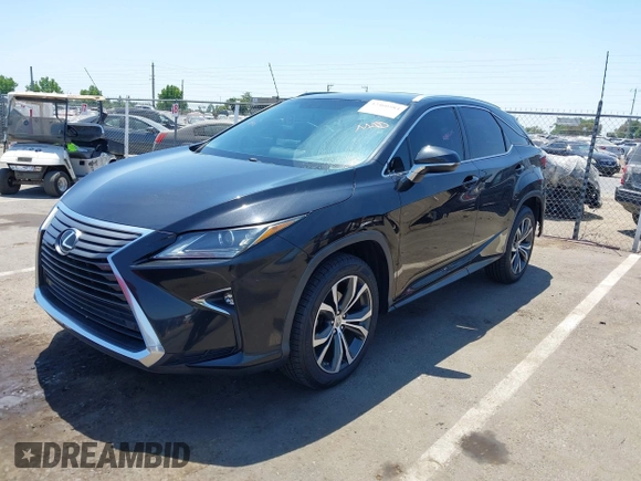 2016 Lexus RX 350 z VIN 2T2ZZMCA2GC031660, wystawiony jako IAAI lot #42460584 z przebiegiem 90 978 mil mil oraz . Historia ofert i sprzedaży dostępna na DreamBid. Obrazek 2.