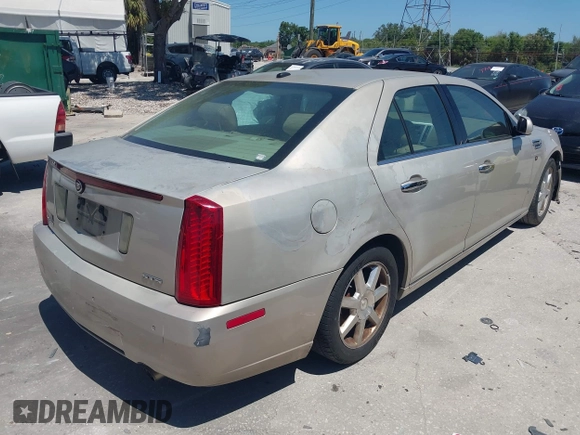 2008 Cadillac STS RWD with VIN 1G6DW67V780153199, listed as a IAAI auction lot 42058808 with 164,961 mi miles and . Bid and sale history available at DreamBid. Image 4.