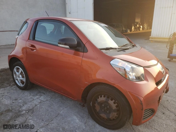 2012 Scion iQ with VIN JTNJJXB00CJ012327, listed as a Copart auction lot 87223244 with 111,223 mi miles and Salvage Title. Bid and sale history available at carsss.com. Image 4.