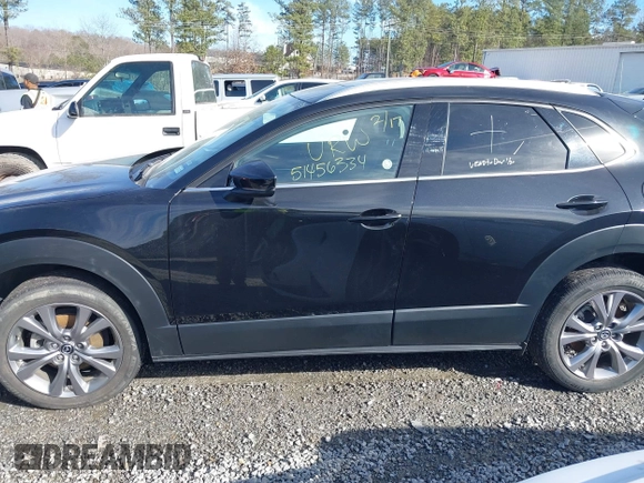 2023 Mazda CX-30 S Premium with VIN 3MVDMBDM7PM528297, listed as a IAAI auction lot 41637542 with 48,935 mi miles and . Bid and sale history available at DreamBid. Image 14.