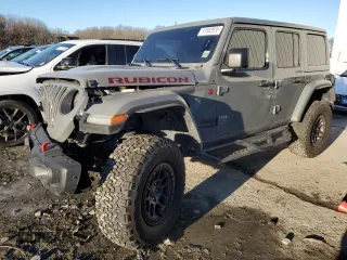 2021 Jeep Wrangler Unlimited Rubicon with VIN 1C4JJXFG5MW790302, listed as a Copart auction lot 41882935 with 50,111 mi miles and Salvage Title. Bid and sale history available at DreamBid. Image 1.