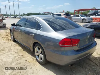 2015 Volkswagen Passat S with VIN 1VWAS7A38FC082760, listed as a IAAI auction lot 42156013 with 199,450 mi miles and . Bid and sale history available at DreamBid. Image 3.