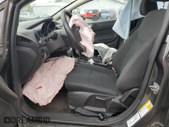 2015 Ford Fiesta SE z VIN 3FADP4BJ8FM150587, wystawiony jako Copart lot #57878275 z przebiegiem Nie podano mil oraz Szkoda całkowita • Salvage title. Historia ofert i sprzedaży dostępna na DreamBid. Obrazek 7.