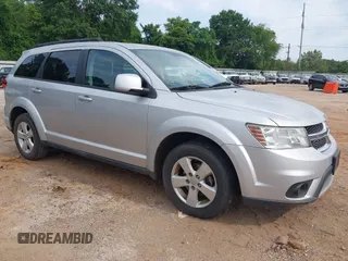 2012 Dodge Journey SXT z VIN 3C4PDCBG4CT189046, wystawiony jako IAAI lot #42410786 z przebiegiem 147 928 mil mil oraz . Historia ofert i sprzedaży dostępna na DreamBid. Obrazek 1.