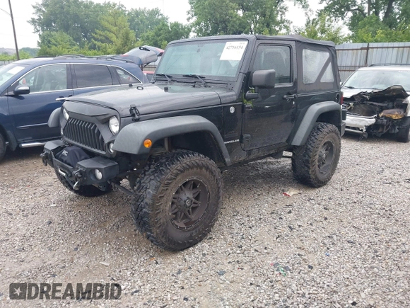 2015 Jeep Wrangler Willys Wheeler with VIN 1C4AJWAG8FL759566, listed as a IAAI auction lot 42716154 with 95,744 mi miles and . Bid and sale history available at DreamBid. Image 2.