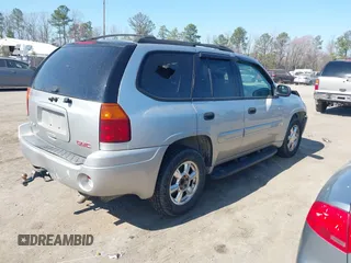 2005 GMC Envoy SLT with VIN 1GKDT13S952219826, listed as a IAAI auction lot 41783713 with 212,908 mi miles. Bid and sale history available at carsss.com. Image 4.