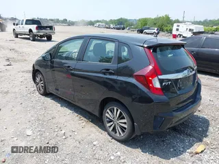 2015 Honda Fit EX-L z VIN 3HGGK5H85FM721566, wystawiony jako IAAI lot #42423777 z przebiegiem 138 825 mil mil oraz . Historia ofert i sprzedaży dostępna na DreamBid. Obrazek 3.