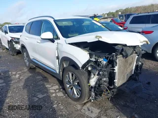 2019 Hyundai Santa Fe SEL with VIN 5NMS33AD1KH045518, listed as a IAAI auction lot 41719014 with 73,477 mi miles and . Bid and sale history available at DreamBid. Image 1.