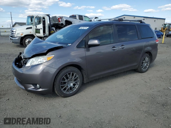 2011 Toyota Sienna XLE with VIN 5TDDK3DC2BS028058, listed as a Copart auction lot 54374215 with 216,905 mi miles and Salvage Title. Bid and sale history available at DreamBid. Image 1.