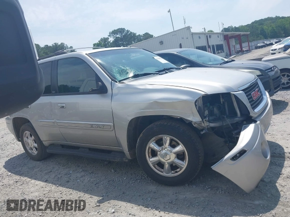 2004 GMC Envoy SLT with VIN 1GKDS13S742230325, listed as a IAAI auction lot 42385113 with 177,989 mi miles and . Bid and sale history available at DreamBid. Image 13.