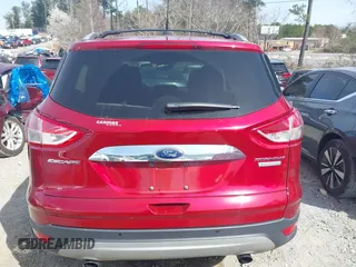 2016 Ford Escape Titanium with VIN 1FMCU0J93GUB11073, listed as a IAAI auction lot 41751349 with 92,000 mi miles. Bid and sale history available at carsss.com. Image 16.