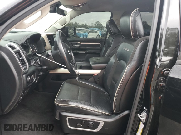 2022 Ram 1500 Laramie with VIN 1C6SRFJT4NN300006, listed as a Copart auction lot 54976775 with 61,436 mi miles and Salvage title. Bid and sale history available at DreamBid. Image 7.