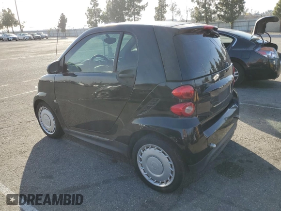 2014 Smart fortwo Pure z VIN WMEEJ3BA0EK744172, wystawiony jako Copart lot #87331964 z przebiegiem 85 162 mil mil oraz Czysty tytuł • Clean title. Historia ofert i sprzedaży dostępna na DreamBid. Obrazek 2.