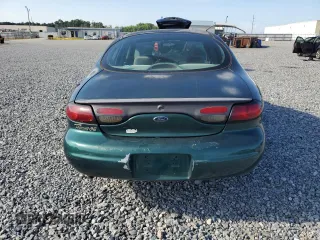 1999 Ford Taurus SE with VIN 1FAFP53U2XG184723, listed as a Copart auction lot 60787115 with 128,277 mi miles and Salvage title. Bid and sale history available at DreamBid. Image 6.