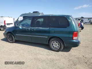 2002 Kia Sedona LX with VIN KNDUP131026325853, listed as a Copart auction lot 65872234 with 114,798 mi miles and Clean Title. Bid and sale history available at carsss.com. Image 2.