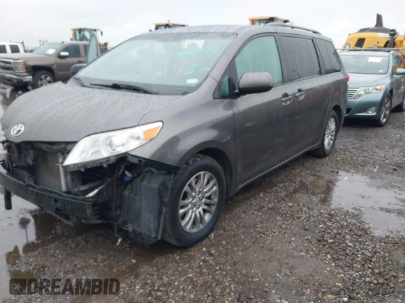 2014 Toyota Sienna XLE with VIN 5TDYK3DC0ES502482, listed as a IAAI auction lot 41910683 with 151,330 mi miles. Bid and sale history available at carsss.com. Image 19.