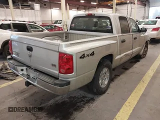 2005 Dodge Dakota Laramie with VIN 1D7HW58N75S188127, listed as a IAAI auction lot 41209206 with 117,480 mi miles and . Bid and sale history available at DreamBid. Image 4.