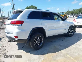 2020 Jeep Grand Cherokee Laredo with VIN 1C4RJFAG5LC258309, listed as a IAAI auction lot 42573007 with 68,980 mi miles and . Bid and sale history available at DreamBid. Image 4.