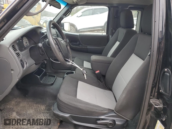 2011 Ford Ranger XLT with VIN 1FTLR4FEXBPA28847, listed as a Copart auction lot 49305335 with 99,034 mi miles and Salvage title. Bid and sale history available at DreamBid. Image 7.