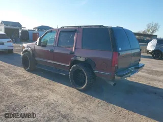 1996 Chevrolet Tahoe with VIN 1GNEK13R9TJ408499, listed as a IAAI auction lot 41308726 with 118,336 mi miles. Bid and sale history available at carsss.com. Image 3.