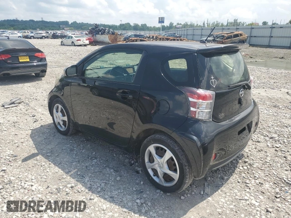 2014 Scion iQ with VIN JTNJJXB07EJ028558, listed as a Copart auction lot 64745345 with 112,221 mi miles and Clean title. Bid and sale history available at DreamBid. Image 2.