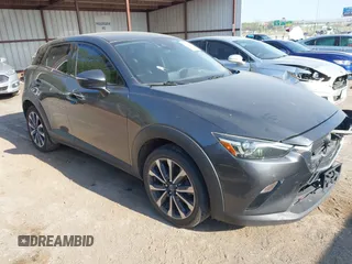 2019 Mazda CX-3 Touring z VIN JM1DKFC70K0445901, wystawiony jako IAAI lot #42028610 z przebiegiem 120 735 mil mil oraz . Historia ofert i sprzedaży dostępna na DreamBid. Obrazek 1.