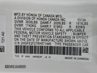 2024 Honda Civic LX z VIN 2HGFE2F27RH571446, wystawiony jako Copart lot #55157415 z przebiegiem 22 687 mil mil oraz Szkoda całkowita • Salvage title. Historia ofert i sprzedaży dostępna na DreamBid. Obrazek 13.