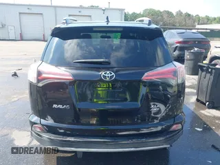2016 Toyota RAV4 XLE with VIN 2T3RFREV9GW458057, listed as a IAAI auction lot 42651373 with 119,750 mi miles and . Bid and sale history available at DreamBid. Image 16.