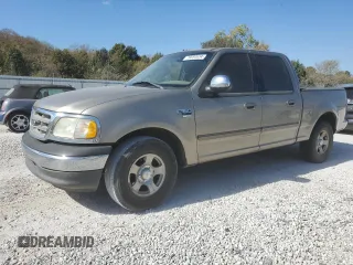 2002 Ford F-150 XLT with VIN 1FTRW07L22KB89313, listed as a Copart auction lot 76680834 with 377,443 mi miles and Salvage Title. Bid and sale history available at DreamBid. Image 1.
