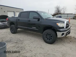 2012 Toyota Tundra 4WD Truck with VIN 5TFDW5F1XCX214437, listed as a Copart auction lot 53457125 with 163,049 mi miles and Clean Title. Bid and sale history available at carsss.com. Image 4.