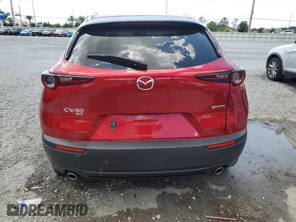 2023 Mazda CX-30 S Carbon Edition с VIN 3MVDMBCM0PM533469, выставлен на аукционе Copart как лот 52646155 с пробегом 22 636 миль миль и На запчасти • Non repairable. История ставок и продаж доступна на DreamBid. Изображение 6.