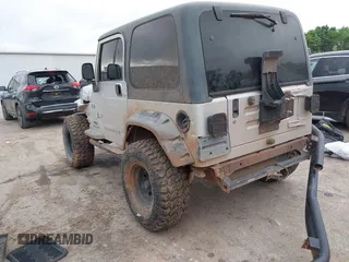 2004 Jeep Wrangler X with VIN 1J4FA39S24P701806, listed as a IAAI auction lot 42218100 with 72,757 mi miles and . Bid and sale history available at DreamBid. Image 3.