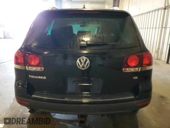 2009 Volkswagen Touareg VR6 z VIN WVGBE77L29D015958, wystawiony jako Copart lot #52019505 z przebiegiem 179 339 mil mil oraz Czysty tytuł • Clean title. Historia ofert i sprzedaży dostępna na DreamBid. Obrazek 6.