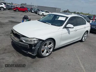 2013 BMW 3 Series 328i with VIN WBA3C1C5XDF437585, listed as a IAAI auction lot 42025388 with 101,963 mi miles. Bid and sale history available at carsss.com. Image 2.