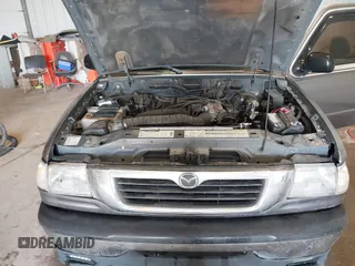 2000 Mazda B-Series 2WD Truck DS with VIN 4F4YR16V8YTM09723, listed as a IAAI auction lot 41365401 with 170,351 mi miles. Bid and sale history available at carsss.com. Image 10.